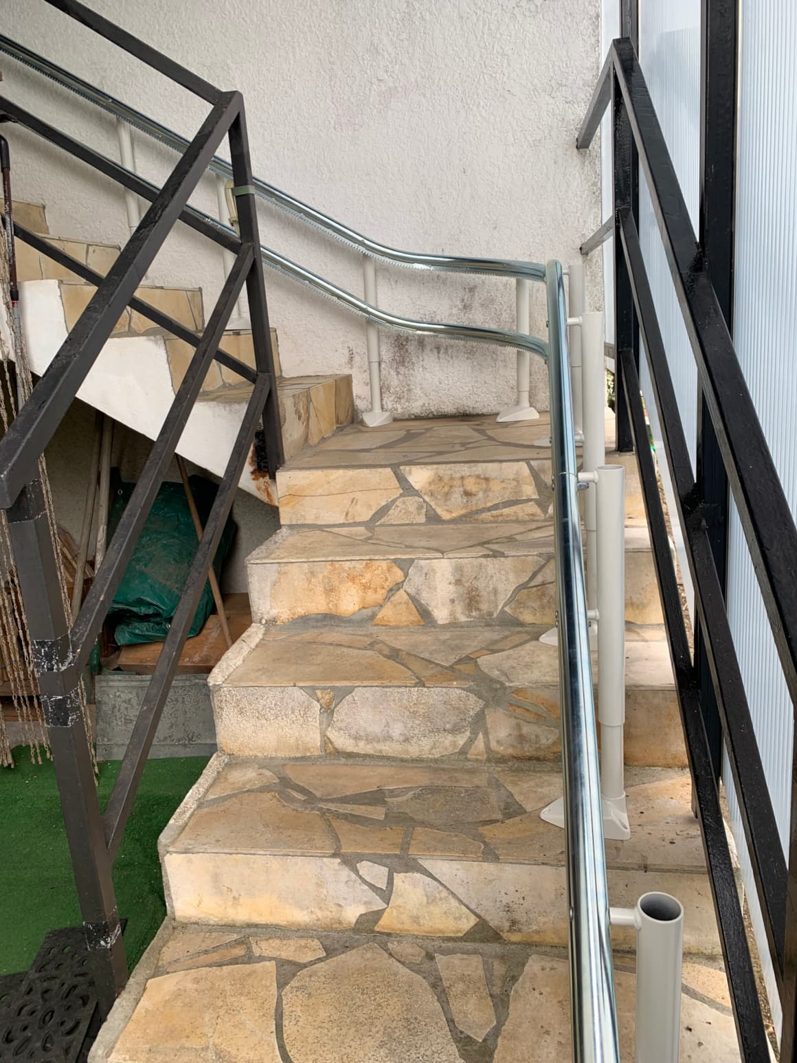 Double-rail d'un monte-escaliers extérieur courbe