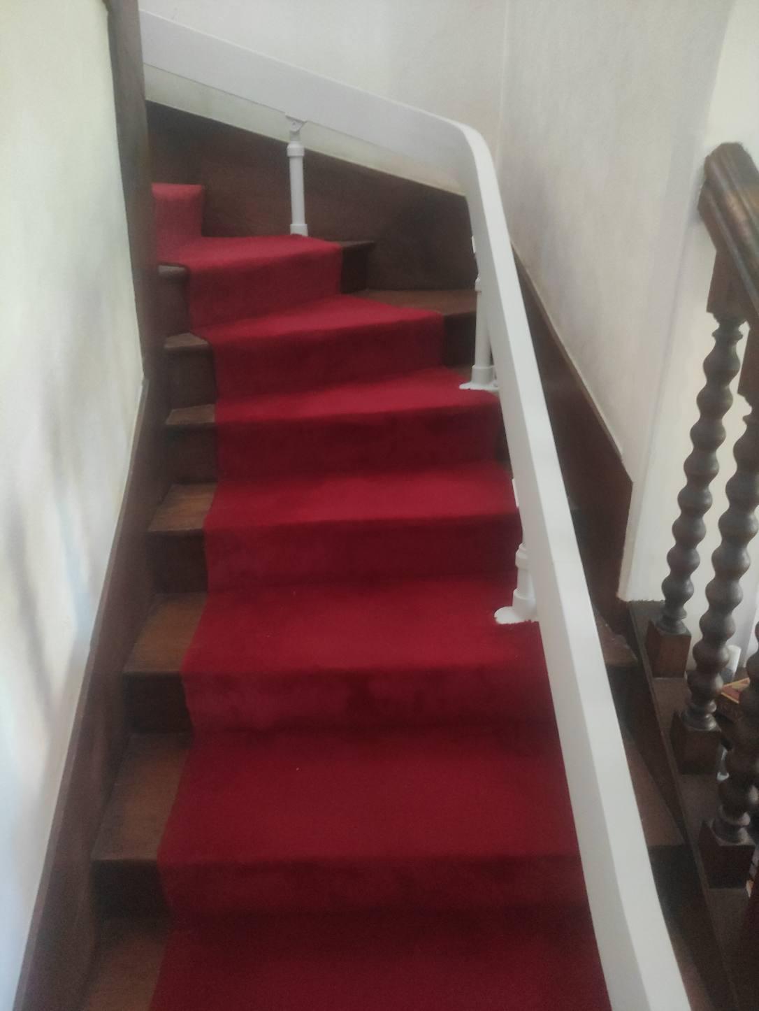 Rail d'un monte-escalier courbe