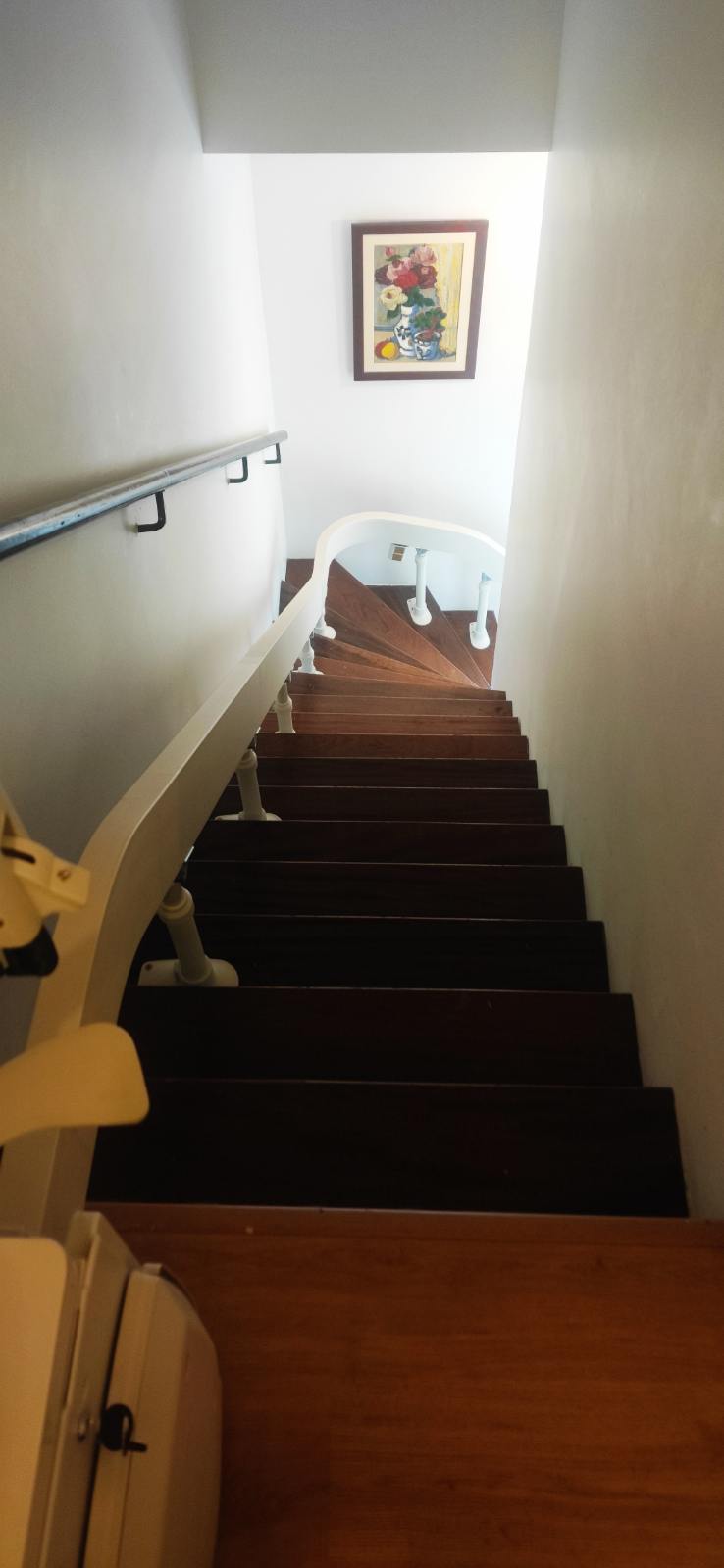 Installation d’un monte-escalier courbe intérieur Acorn à Oloron